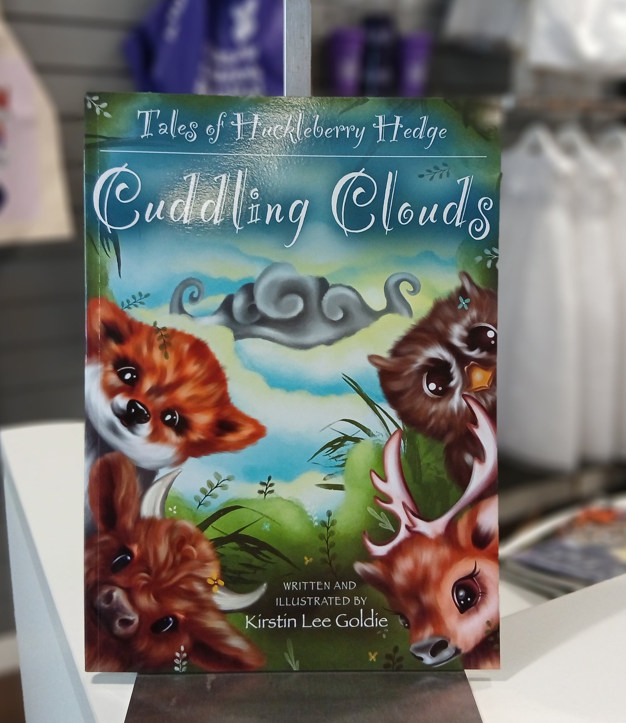 Tales of Huckleberry Hedge - Cuddling Clouds